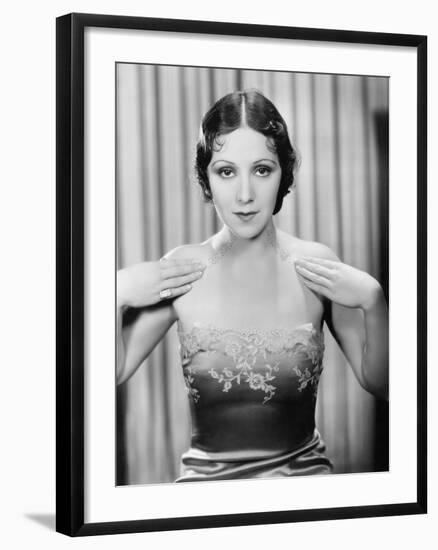 Woman Showing Her Evening Dress-null-Framed Photo