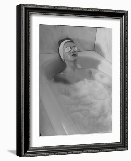 Woman Showing How to Take a Bath-Nina Leen-Framed Photographic Print