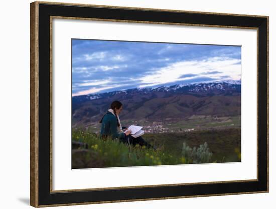 Woman Sits On Top Of A Hill Sketching-Hannah Dewey-Framed Photographic Print