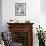 Woman Sitting at a Breakfast Table-null-Framed Photo displayed on a wall