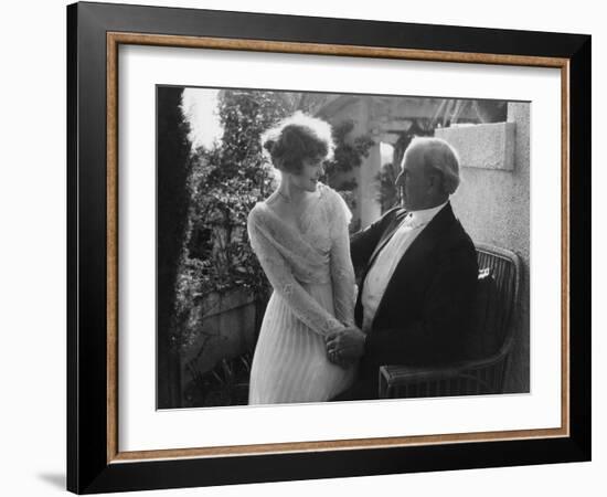 Woman Sitting in Man's Lap-null-Framed Photo