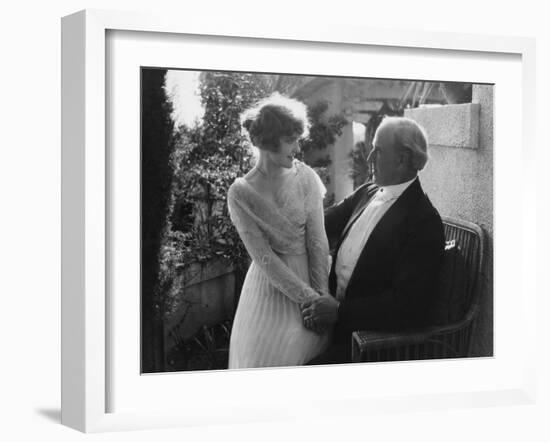 Woman Sitting in Man's Lap-null-Framed Photo