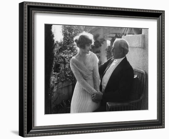 Woman Sitting in Man's Lap-null-Framed Photo