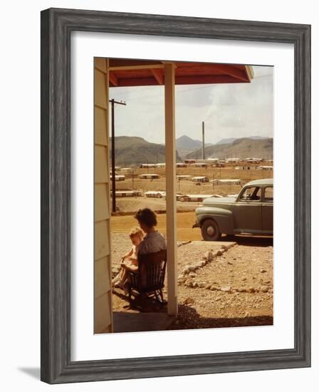 Woman Sitting in Rocking Chair on Veranda Playing with Baby on Her Lap-Andreas Feininger-Framed Photographic Print