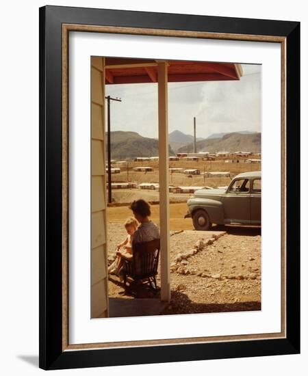 Woman Sitting in Rocking Chair on Veranda Playing with Baby on Her Lap-Andreas Feininger-Framed Photographic Print