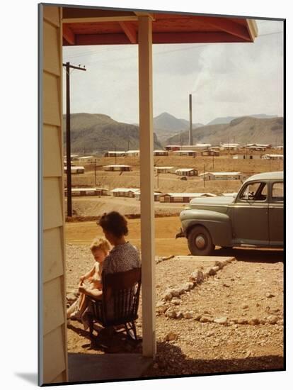 Woman Sitting in Rocking Chair on Veranda Playing with Baby on Her Lap-Andreas Feininger-Mounted Photographic Print