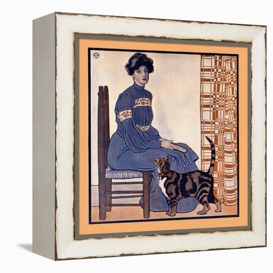 Woman Sitting On A Chair Holding A Book With A Cat Looking On-Edward Penfield-Framed Stretched Canvas