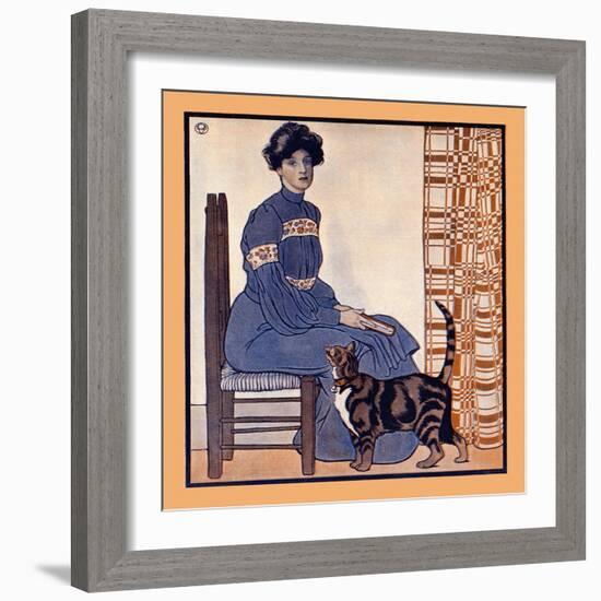 Woman Sitting On A Chair Holding A Book With A Cat Looking On-Edward Penfield-Framed Art Print