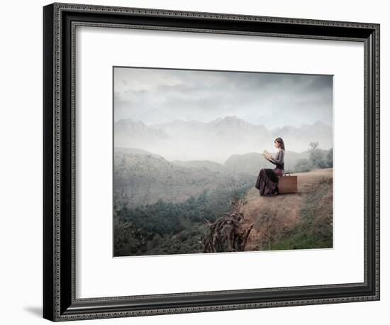 Woman Sitting On A Suitcase And Reading A Book With Landscape On The Background-olly2-Framed Premium Giclee Print