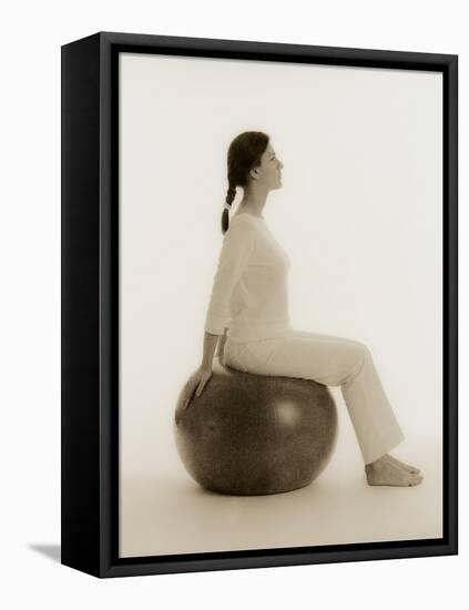 Woman Sitting on Exercise Ball-Cristina-Framed Premier Image Canvas