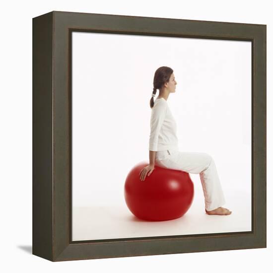 Woman Sitting on Exercise Ball-Cristina-Framed Premier Image Canvas