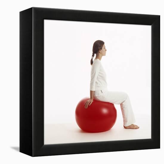 Woman Sitting on Exercise Ball-Cristina-Framed Premier Image Canvas