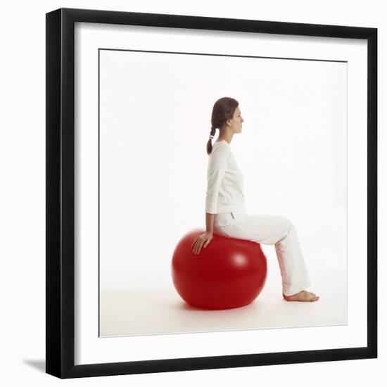 Woman Sitting on Exercise Ball-Cristina-Framed Premium Photographic Print