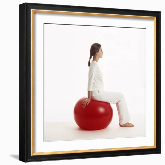 Woman Sitting on Exercise Ball-Cristina-Framed Premium Photographic Print