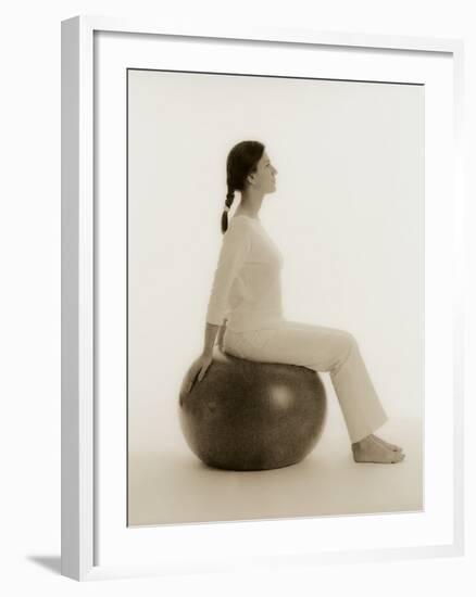 Woman Sitting on Exercise Ball-Cristina-Framed Photographic Print