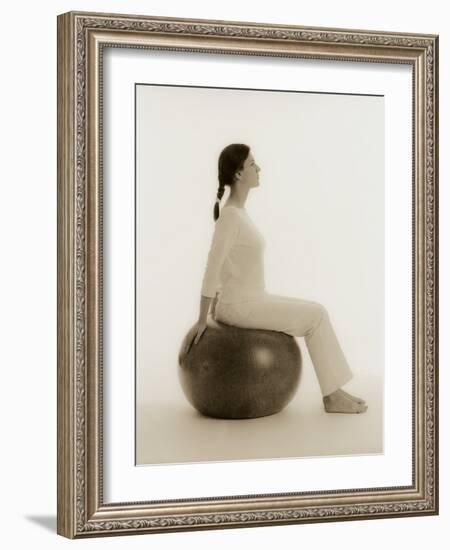 Woman Sitting on Exercise Ball-Cristina-Framed Photographic Print