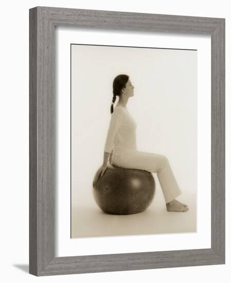 Woman Sitting on Exercise Ball-Cristina-Framed Photographic Print