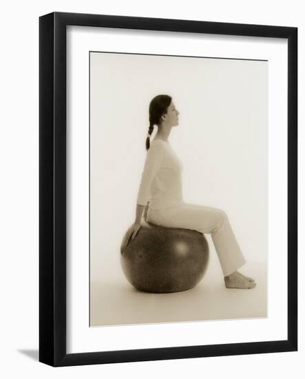 Woman Sitting on Exercise Ball-Cristina-Framed Photographic Print