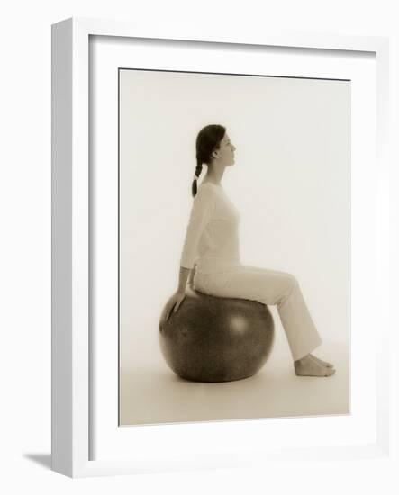 Woman Sitting on Exercise Ball-Cristina-Framed Photographic Print