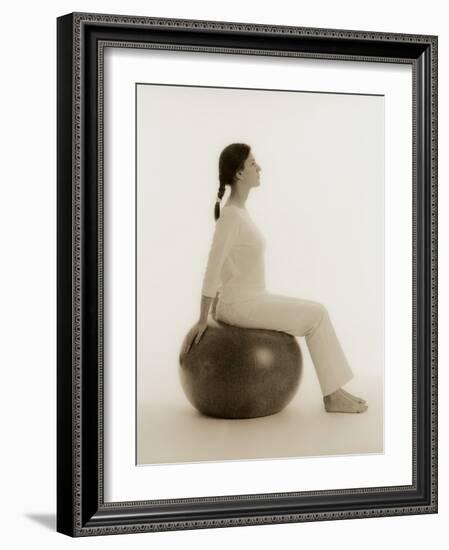 Woman Sitting on Exercise Ball-Cristina-Framed Photographic Print