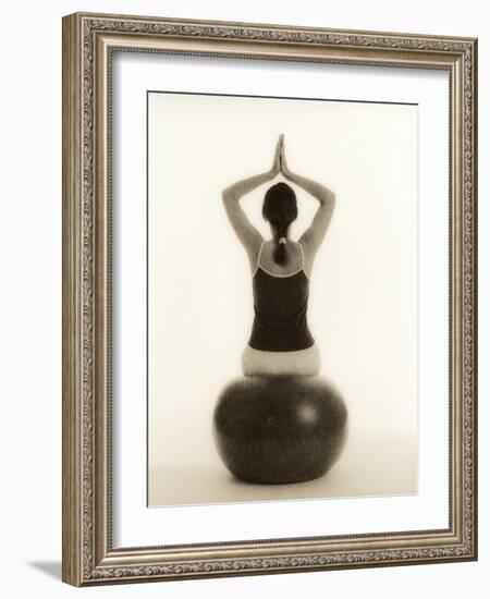 Woman Sitting on Exercise Ball-Cristina-Framed Photographic Print