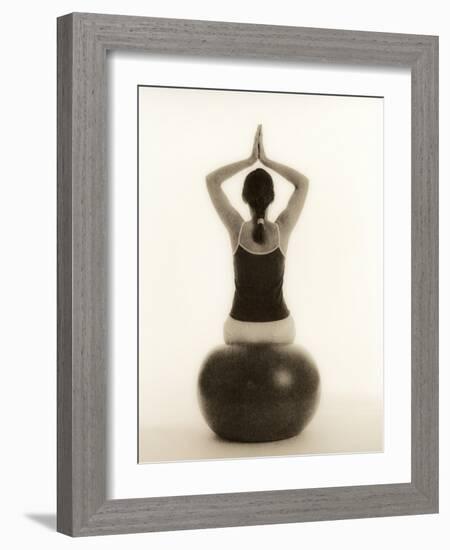 Woman Sitting on Exercise Ball-Cristina-Framed Photographic Print