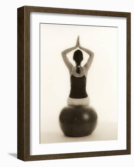 Woman Sitting on Exercise Ball-Cristina-Framed Photographic Print