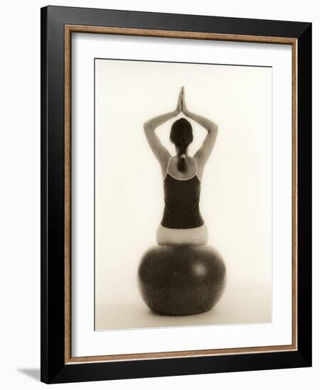 Woman Sitting on Exercise Ball-Cristina-Framed Photographic Print