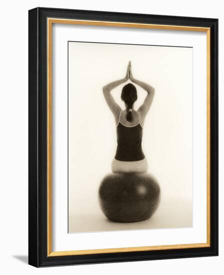 Woman Sitting on Exercise Ball-Cristina-Framed Photographic Print