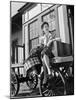 Woman Sitting on Luggage Trolley-Philip Gendreau-Mounted Photographic Print