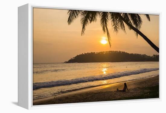 Woman Sitting on Mirissa Beach Watching the Sun Set-Matthew Williams-Ellis-Framed Premier Image Canvas