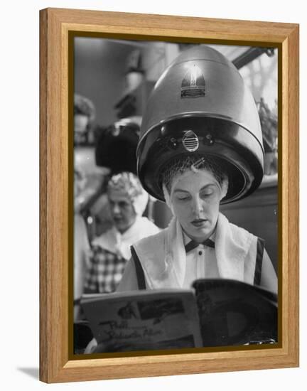 Woman Sitting under Hair Dryer Reading a Magazine-Gordon Parks-Framed Premier Image Canvas