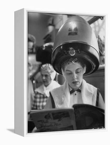 Woman Sitting under Hair Dryer Reading a Magazine-Gordon Parks-Framed Premier Image Canvas