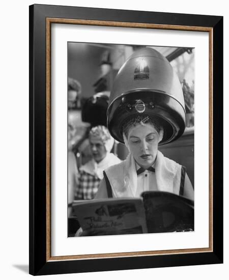 Woman Sitting under Hair Dryer Reading a Magazine-Gordon Parks-Framed Photographic Print