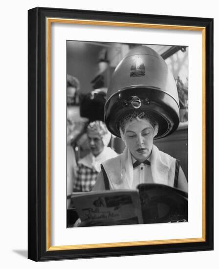 Woman Sitting under Hair Dryer Reading a Magazine-Gordon Parks-Framed Photographic Print