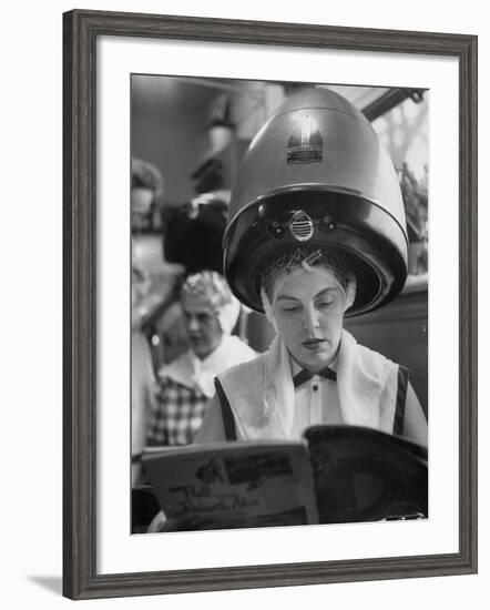 Woman Sitting under Hair Dryer Reading a Magazine-Gordon Parks-Framed Photographic Print