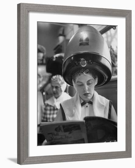 Woman Sitting under Hair Dryer Reading a Magazine-Gordon Parks-Framed Photographic Print