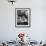 Woman Sitting under Hair Dryer Reading a Magazine-Gordon Parks-Framed Photographic Print displayed on a wall