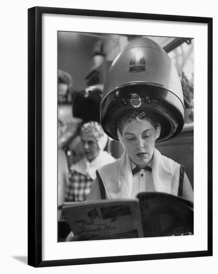 Woman Sitting under Hair Dryer Reading a Magazine-Gordon Parks-Framed Photographic Print