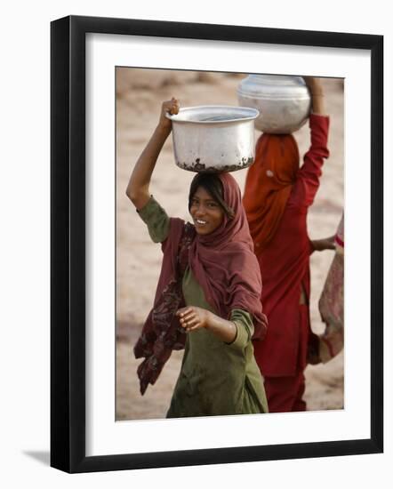 Woman Smiles after Collecting Drinking Water, on the Outskirts of Islamabad, Pakistan-null-Framed Photographic Print