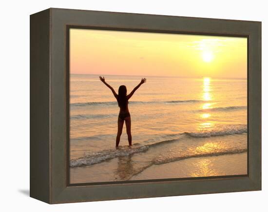 Woman Standing In the Sea-Bjorn Svensson-Framed Premier Image Canvas
