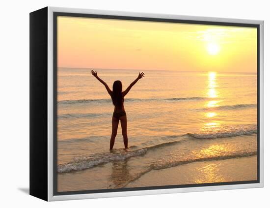 Woman Standing In the Sea-Bjorn Svensson-Framed Premier Image Canvas