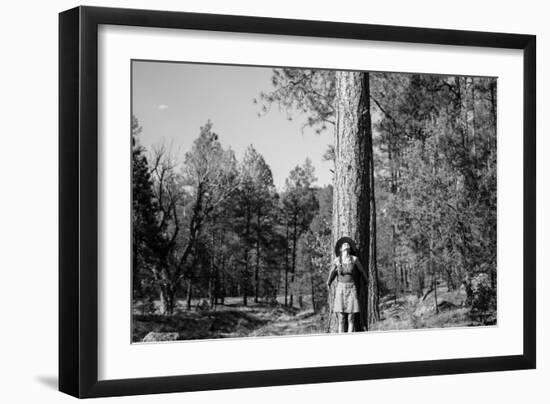 Woman Stands With Her Arms Wrapped Around A Ponderosa Pine Tree Looking Up And Smiling-Hannah Dewey-Framed Photographic Print