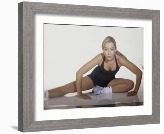 Woman Stretching Before Exercise-null-Framed Photographic Print