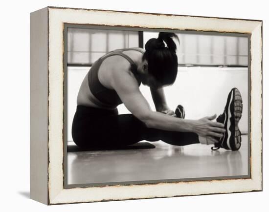 Woman Stretching During a Workout, New York, New York, USA-Paul Sutton-Framed Premier Image Canvas