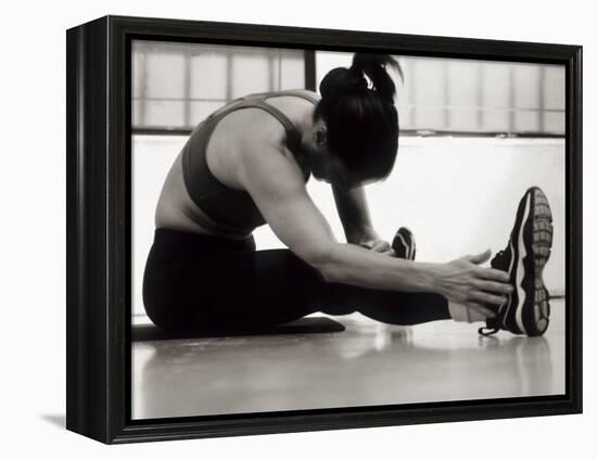 Woman Stretching During a Workout, New York, New York, USA-Paul Sutton-Framed Premier Image Canvas