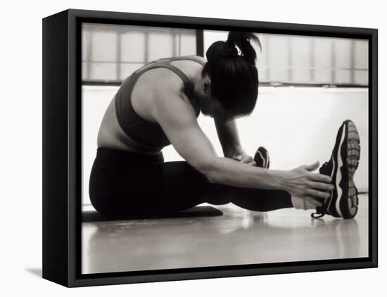 Woman Stretching During a Workout, New York, New York, USA-Paul Sutton-Framed Premier Image Canvas