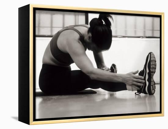Woman Stretching During a Workout, New York, New York, USA-Paul Sutton-Framed Premier Image Canvas