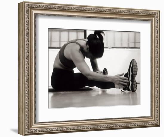 Woman Stretching During a Workout, New York, New York, USA-Paul Sutton-Framed Photographic Print