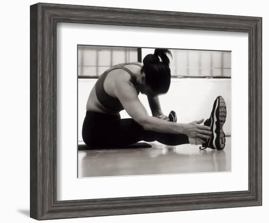 Woman Stretching During a Workout, New York, New York, USA-Paul Sutton-Framed Photographic Print